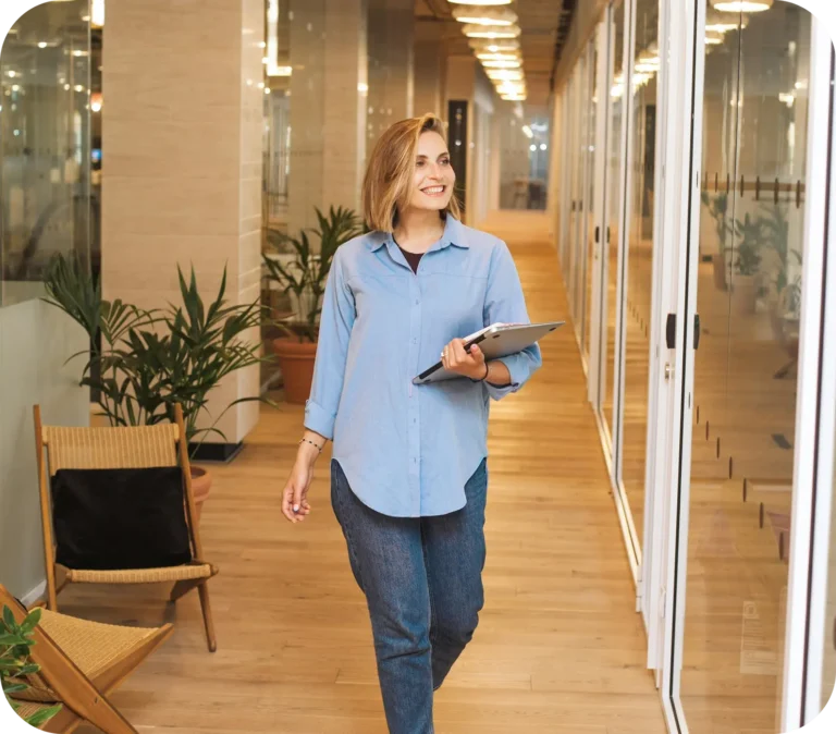 Business consultant walking through In Centar coworking office in Belgrade, Serbia